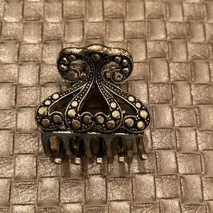 Silvertone metal hair clip